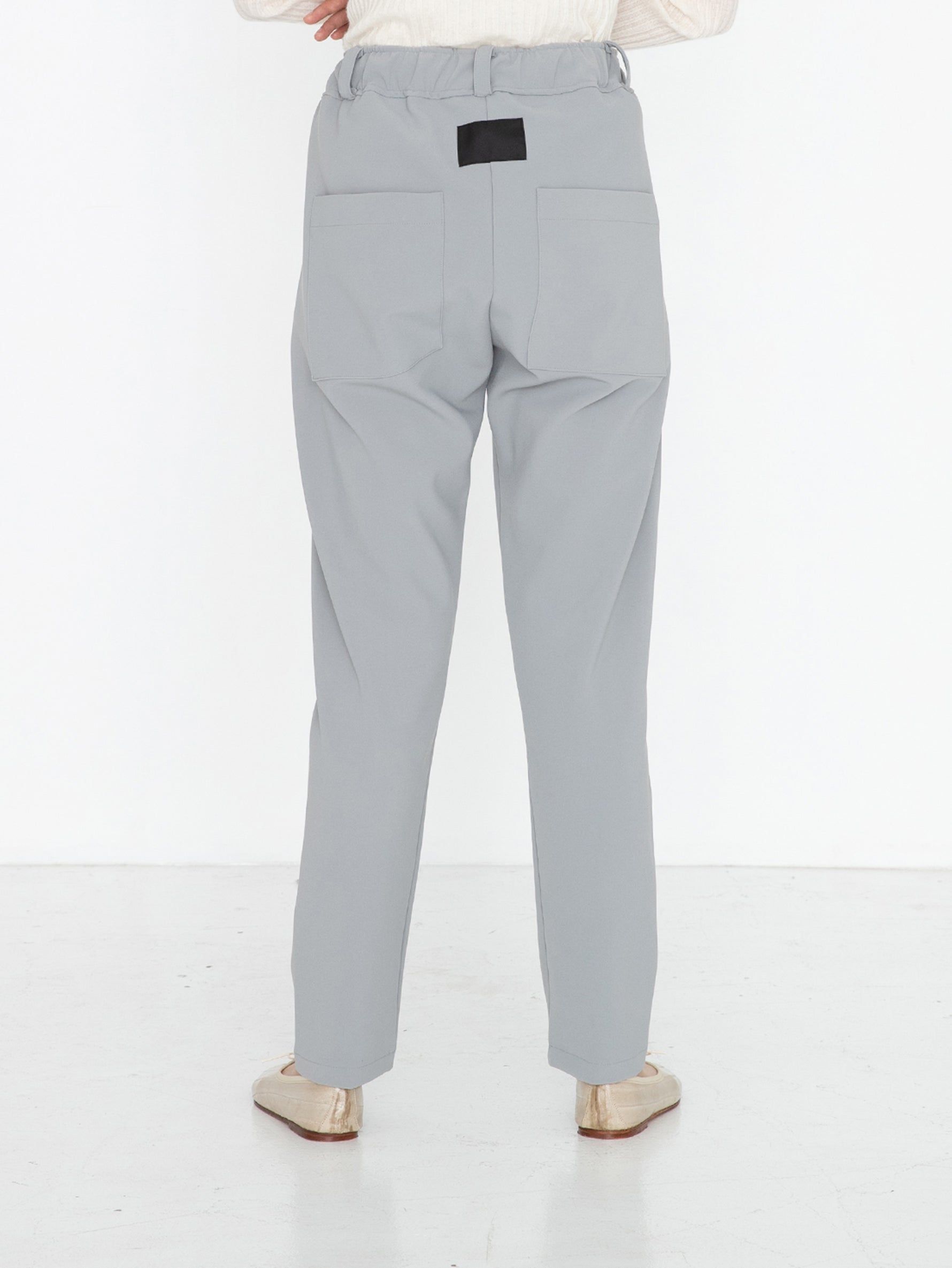 COGTHEBIGSMOKE | スリット付きナローレッグパンツ KAILEE ZIP SLIT TROUSERS