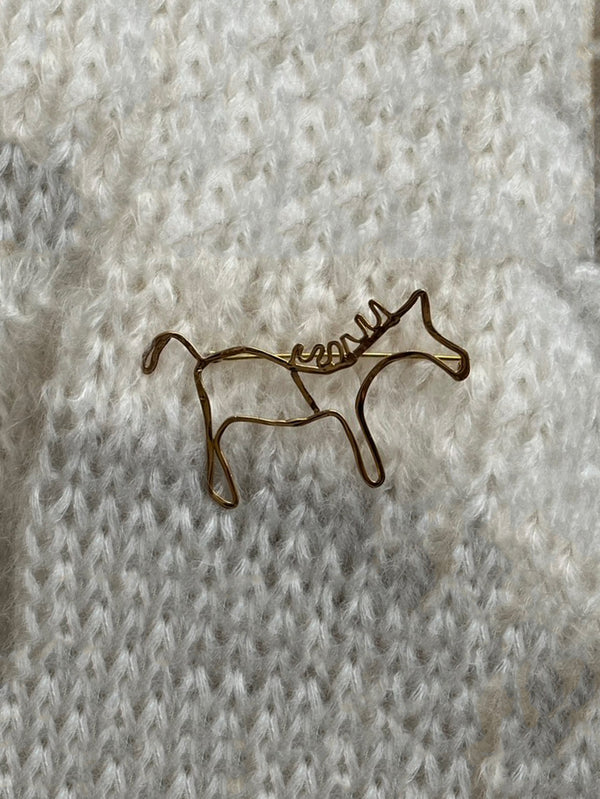 Miriam Nori  | spilla/broach/ spilla zebra a cornice